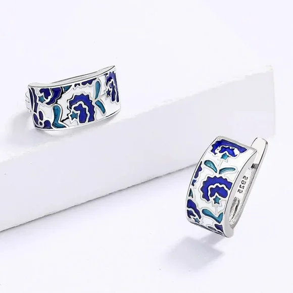 Sterling silver earrings with blue acrylic accents. - Picture 4 of 5